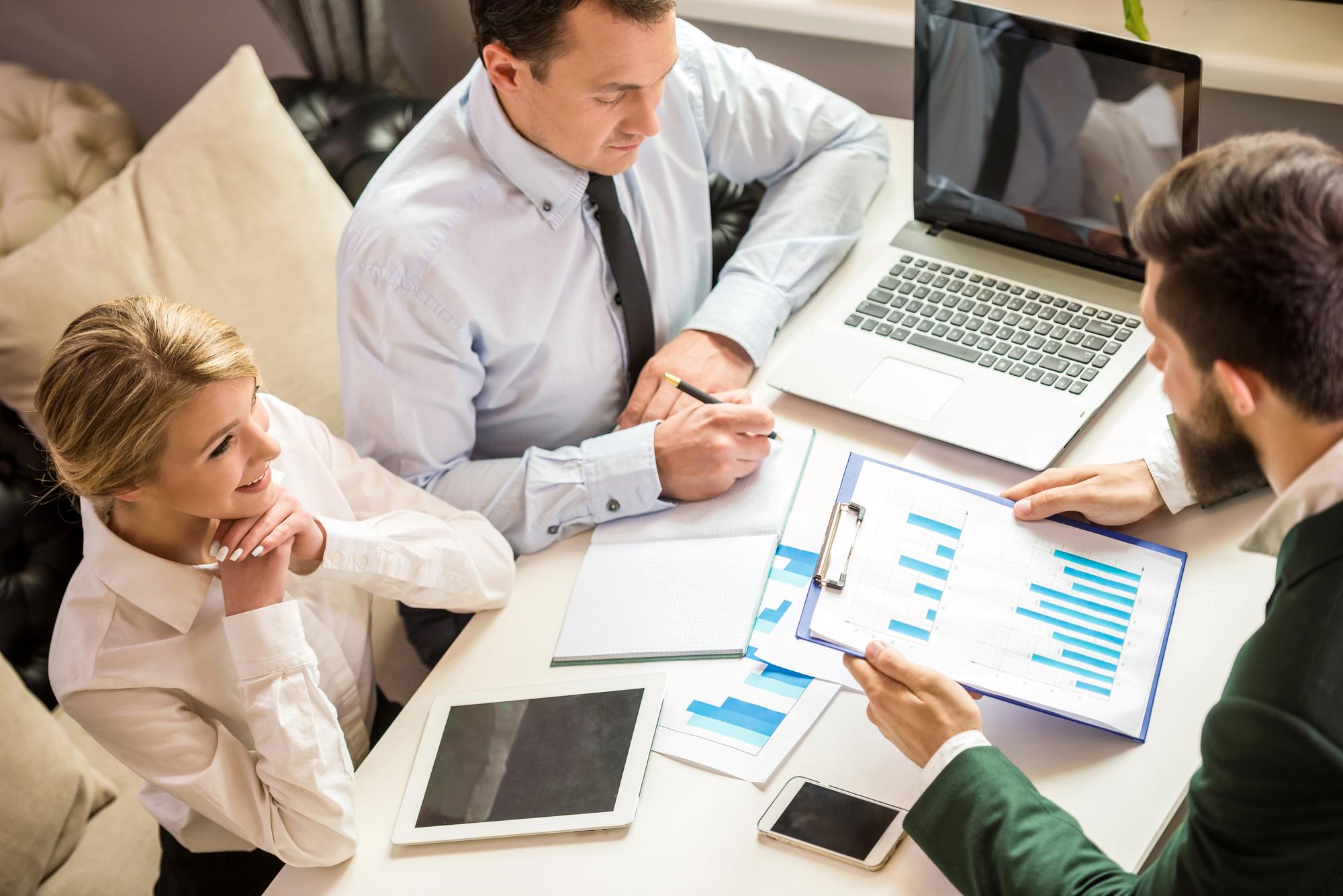 Advisor reviewing financial charts with client